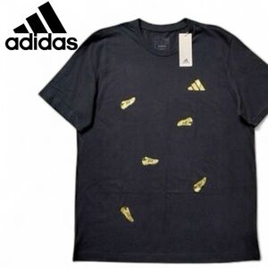 Adidas Men's Black Tee with Yellow Soccer Cleats. NEW